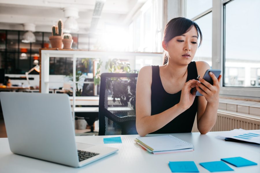 Young businesswoman using mobile phone