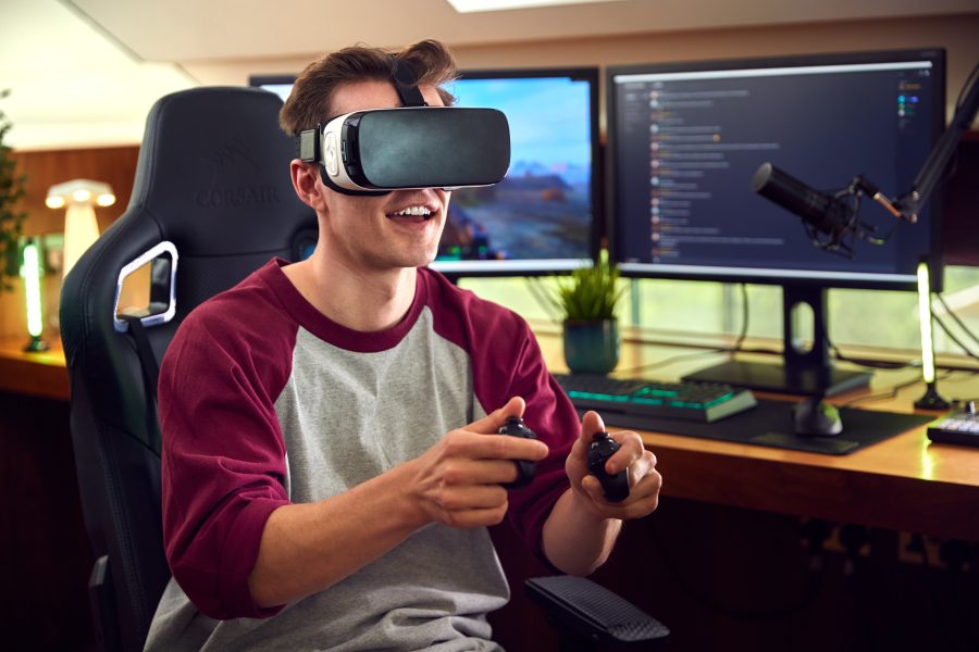 man wearing virtual reality headset gaming at home 2022 11 10 18 00 53 utc min