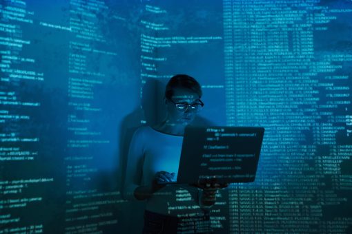 Data Sovereignty and Digital Colonialism: How to Defend Against Next-Generation Digital Exploitation confident young woman using computer against dark 2025 02 22 02 06 26 utc